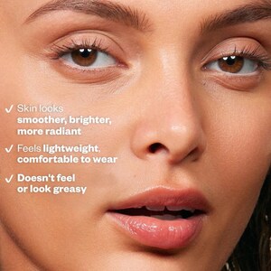 May include: Close-up of a person's face showing the results of using a skin care product. The text on the image reads: "Skin looks smoother, brighter, more radiant. Feels lightweight, comfortable to wear. Doesn't feel or look greasy."