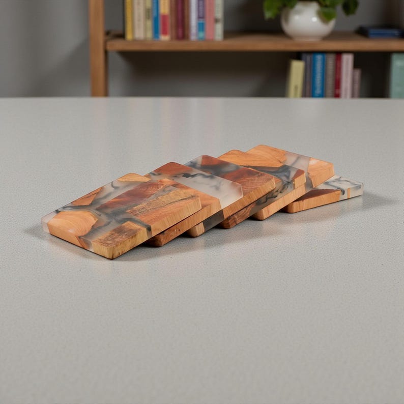 Handmade Eastern Cedar wood and resin coasters set with natural brown grain, aromatic cedar, and matching holder.