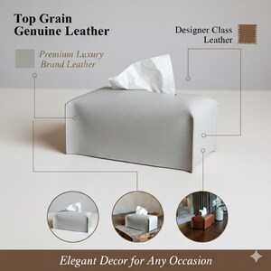 Puede incluir: Un dispensador de pa&ntilde;uelos de cuero gris claro con forma rectangular. El dispensador est&aacute; hecho de cuero genuino de grano superior y est&aacute; etiquetado como cuero de marca de lujo premium. El texto "Elegant Decor for Any Occasion" est&aacute; en la parte inferior.