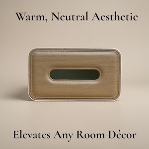 Rectangular PU leather tissue box cover with linen‑style beige texture and stitched wooden top, designed to fit standard Kleenex rectangular boxes. Features a modern, minimalist look that blends seamlessly with home décor styles from contemporary to boho. Durable magnetic closure allows easy tissue replacement, while the elegant design makes it perfect for bathroom, bedroom, living room, or office use. A stylish and functional home accessory or thoughtful gift idea.