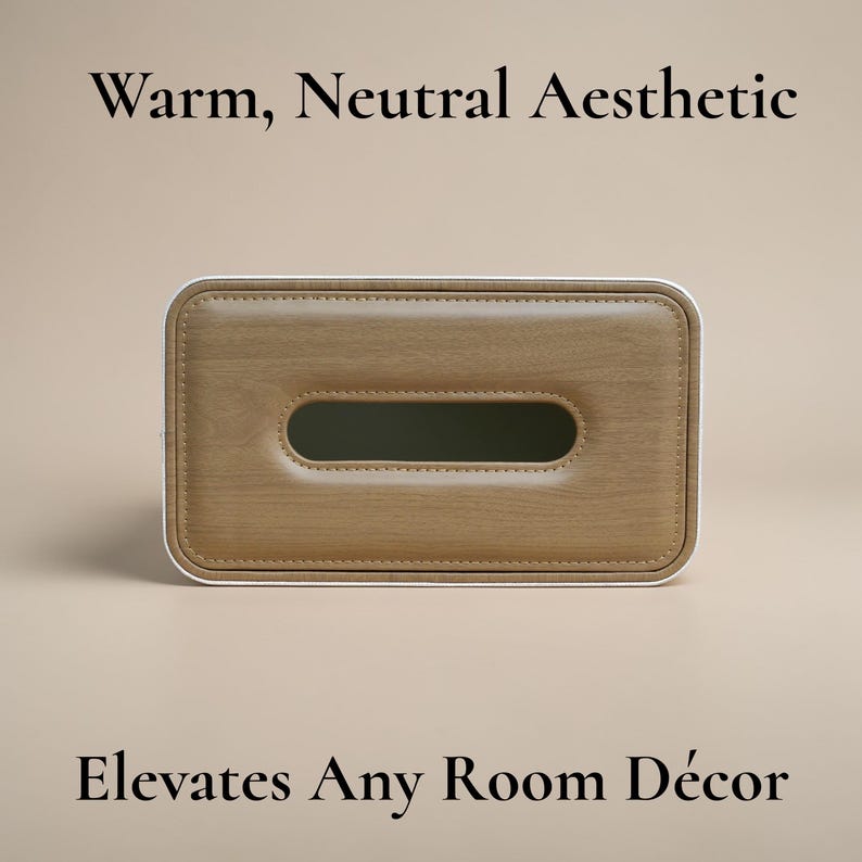 Rectangular PU leather tissue box cover with linen‑style beige texture and stitched wooden top, designed to fit standard Kleenex rectangular boxes. Features a modern, minimalist look that blends seamlessly with home décor styles from contemporary to boho. Durable magnetic closure allows easy tissue replacement, while the elegant design makes it perfect for bathroom, bedroom, living room, or office use. A stylish and functional home accessory or thoughtful gift idea.