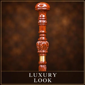 May include: A polished brown wooden walking stick handle featuring a rounded top, intricate carved floral patterns, and a smooth brass-colored metal ring connector. The shaft displays a rich wood grain finish with a glossy, reflective surface.