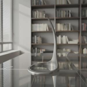 May include: A modern, silver-colored desk lamp with a curved, slender design. The lamp has a circular base and a long, arched neck that extends upwards. The lamp is made of metal and sits on a glass surface.