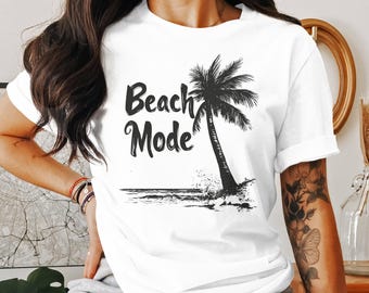 Maglietta grafica con palma in modalità spiaggia: atmosfera da vacanza estiva