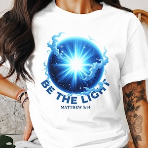 Christliches T-Shirt, sei das Licht, Matthäus 5:14, Inspirational T-Shirt, Glaubensbasierte Bekleidung, religiöses Shirt, Bibel-Vers Top