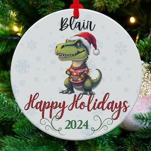 Dinosaur Christmas Ornament 2024, Personalized Happy Holidays Decor, Santa Hat Dino Ornament, Festive T Rex Christmas Decoration
