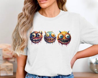 Funny Monster Faces T-Shirt, Unique Graphic Tee, Colorful Monster Artwork, Creepy Cute Monsters, Eye-catching Design, Unisex Tee