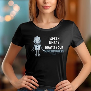 May include: Black t-shirt with a robot graphic and the text "I speak binary. What's your superpower?"