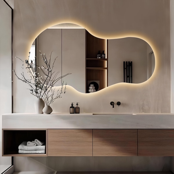 Asymmetrische ledbadkamerspiegel: modern verlicht frameloos decor