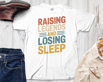 Raising Legends Graphic Tee: Funny Retro Parent T-Shirt