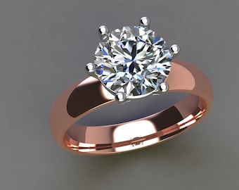 May include: A rose gold engagement ring with a large, round, clear diamond set in a six-prong setting.