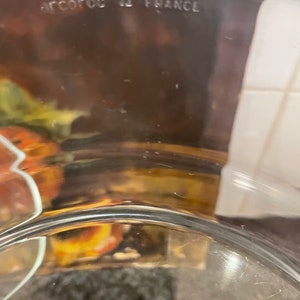 May include: A clear glass bowl with the text "ARCOCOC IN FRANCE" on the bottom.