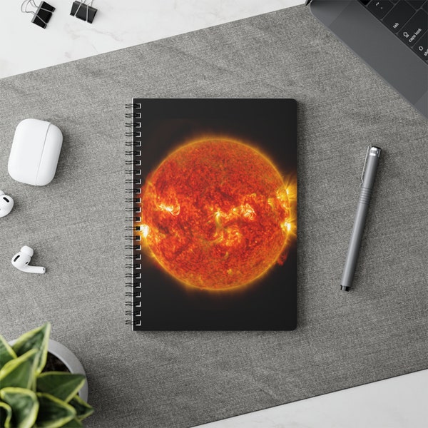 NASA's images of the sun emitting a mid-level solar flare inspired Notebook Journal.Celestial,Solstice,Daylight,Sunshine,Radiance,Sunbeam.