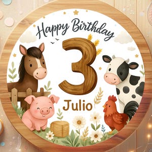 May include: A round wooden cake topper with a farm animal theme. The design includes a brown horse, a pink pig, a black and white cow, and a red rooster. The text "Happy Birthday 3 Julio" is written in black script.