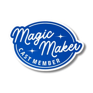 May include: A blue and white sticker with the words "Magic Maker" in a script font, surrounded by a blue oval. The words "CAST MEMBER" are in a smaller font around the bottom of the oval.