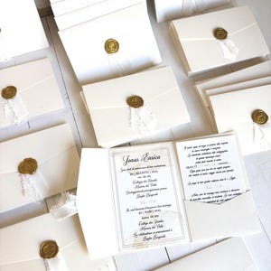 inviti bianchi oro matrimonio.