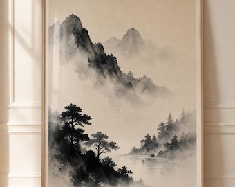 May include: A framed wall art print featuring a monochromatic ink wash landscape painting. The artwork depicts jagged mountain peaks shrouded in mist, with dark silhouettes of pine trees in the foreground and a calm body of water below.
