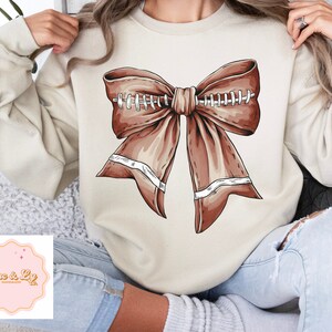 Football Bow Shirt, Sweatshirt with large bow, Girly Girl, Coquette aesthetic, game day, fall sports, cozy crewneck, preppy bows, girls bow