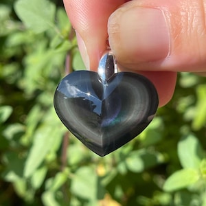 Colgante de corazón de obsidiana de ojo celestial