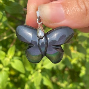 Colgante de mariposa de obsidiana de ojo celestial