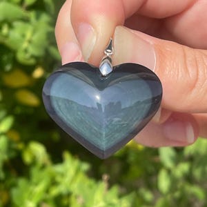 Magnífico colgante de corazón de obsidiana con ojo celestial