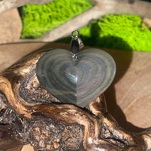 Colgante de corazón de obsidiana de ojo celestial