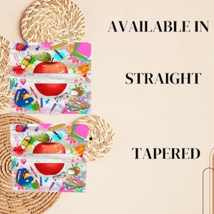 May include: Two images of a sublimation design featuring a red apple with a white banner and school supplies on a white wood background. The text "AVAILABLE IN" is above the images and the text "STRAIGHT" is below the first image and the text "TAPERED" is below the second image.