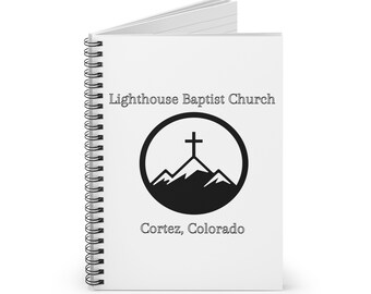 Cuaderno espiral con líneas rayadas y logotipo de la iglesia LBC