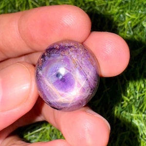 Rubí estrella natural ovalado cabujón: 59,40 quilates, rojo intenso, gema africana certificada.