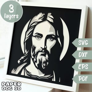 Op de afbeelding: Een ingelijst papieren kunstwerk met een gelaagd portret van Jezus Christus in zwart-wit. Het kunstwerk is gelabeld met "3 layers" en "PAPER DOG 3D". Inclusief SVG-, DXF-, EPS- en PDF-bestandsformaten.