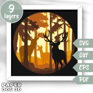 May include: A 9-layer papercraft model of two deer standing in a forest. The deer are silhouetted against a sunset background. The model is made of paper and is designed to be assembled by hand.
