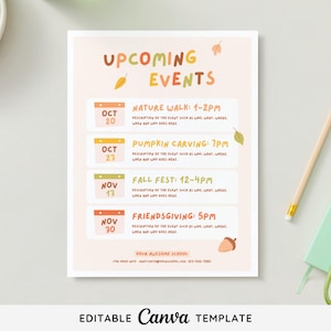 May include: A pastel-colored flyer with the words "Upcoming Events" in orange and brown. The flyer lists four fall-themed events: Nature Walk, Pumpkin Carving, Fall Fest, and Friendsgiving. A pencil, keys, and grapes are also visible.
