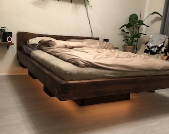 Floating wooden bed, flamed larch wood (160 cm x 200 cm)