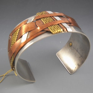 Mixed Metals of Copper Brass and Sterling Riveted on a Wide Band Sterling Cuff KHB1533
