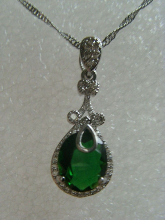 Art-Deco CZ Pear cut emerald green & white sapphir