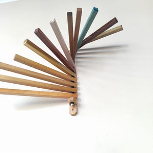Tendedero plegable de madera de haya para pared: organizador para espacios pequeños