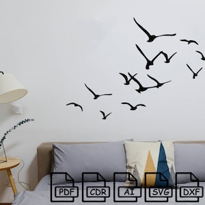 May include: A digital download of a flock of birds in flight, perfect for creating a wall decal or vinyl sticker. The file formats included are PDF, CDR, AI, SVG, DXF, and ZIP.