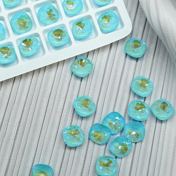 Blue Lagoon: A4470 Round Square 10mm Crystal Summer Blue DeLite, 10mm high shine K9 Glass nail art chaton pointed bottom rhinestones