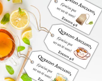 May include: Three white gift tags with the text "QUERIDO ANCIANO, ¡Gracias por ser un té-soro! EFESIOS 4:8". Each tag has a different tea-related illustration: a tea bag, a teacup, and a teacup with a saucer. The image also includes lemons, mint, and a honey dipper.