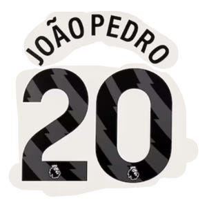 May include: A white sticker with the name "JOÃO PEDRO" arched across the top in black letters. Below, the number "20" is displayed in black with gray lightning bolt stripes. The Premier League logo is at the bottom.