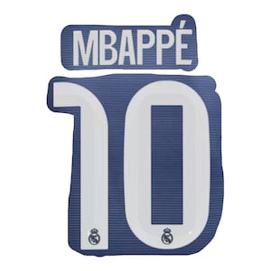 May include: A navy blue patch with the name "MBAPPÉ" in white block letters above the number "10". The number is white with a navy blue outline. The Real Madrid logo is at the bottom of the number.