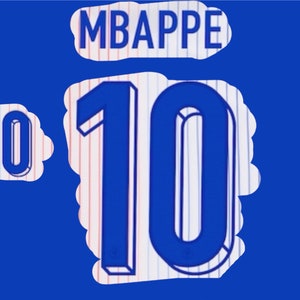 May include: A blue and white jersey with the number 10 on the front and the name "MBAPPE" above it.