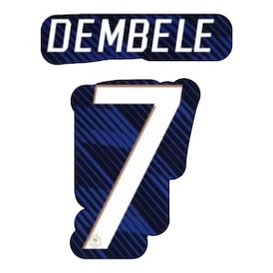 May include: A blue and white graphic featuring the name "DEMBELE" above the number "7". The number is white with a blue patterned background. The graphic is likely for sports apparel.