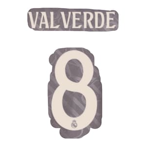 Peut inclure: Un autocollant avec le nom "VALVERDE" en blanc sur un fond gris. En dessous, un grand chiffre "8" en blanc est affiché, également sur un fond gris, avec un petit emblème en bas.