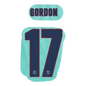 May include: A light turquoise sports jersey decal featuring the name GORDON in dark blue block letters above the number 17. The number 17 is dark blue with a dotted texture, a thin red outline, and a small crest at the base of each digit.