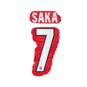 May include: A red and white soccer jersey number 7 with the name "SAKA" above it. The number 7 is white with a black outline and the England team logo at the bottom. The name "SAKA" is in white letters on a red background.