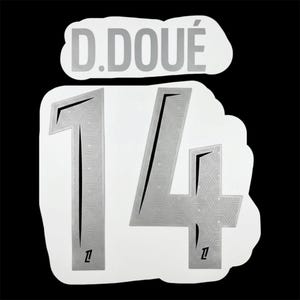 May include: A white sticker featuring the name "D. DOUÉ" above the number "14". The silver-coloured text and numbers have a geometric pattern. The background is black.