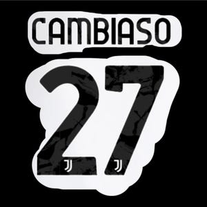 May include: A black and white sticker with the name "CAMBIASO" at the top and the number "27" below. The number has a textured pattern, and the Juventus logo is at the base of the numbers. The background is solid black.