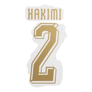 May include: A gold-colored sticker with the name "HAKIMI" above the number "2". The number is large and stylized, with a gold outline and a white background. The text is also gold.