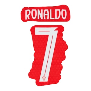 May include: A red and white graphic featuring the name "RONALDO" above the number "7". The number has a white outline and a small emblem at the bottom. The design is on a white background.